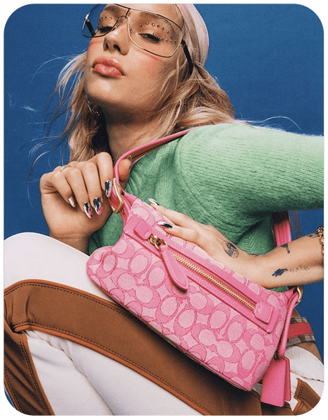 Influencer holding a pink monogram bag