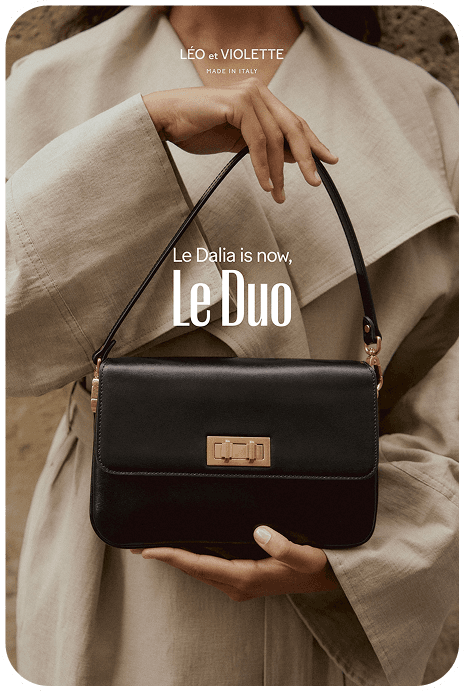 Le Duo ad featuring a black structured bag